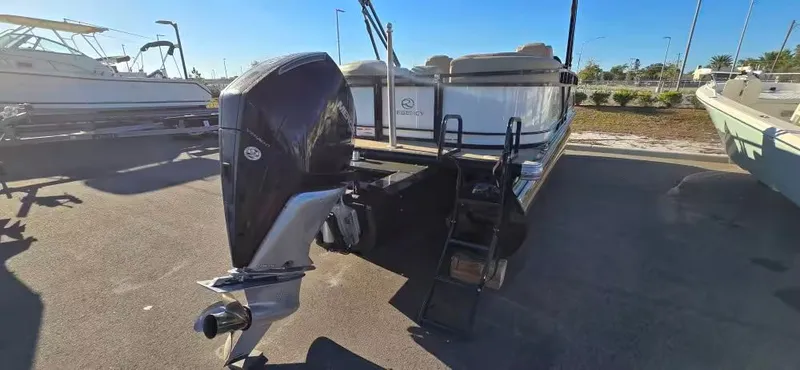 Slide: The Image of 2020 Regency 230 DL3 pontoon boat with outboard motor. - 5