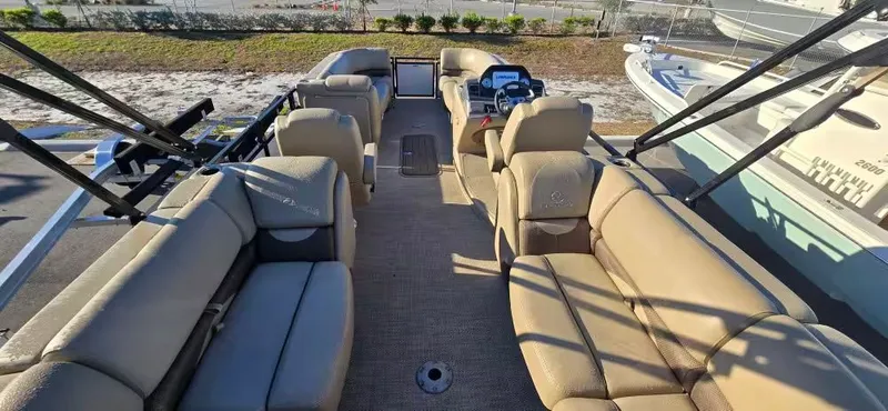 Slide: The Image of Interior view of a 2020 Regency 230 DL3 pontoon boat. - 9