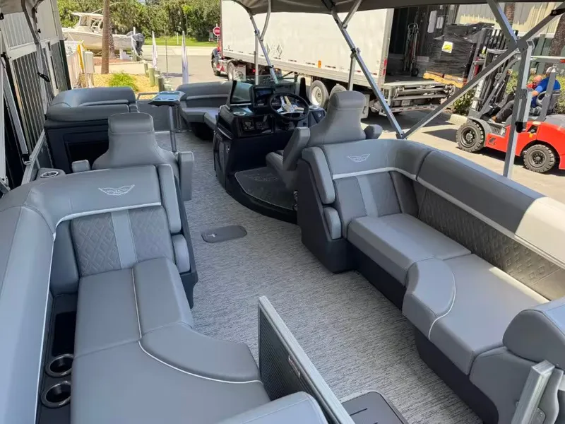 Slide: The Image of Interior of 2026 Bennington 24 MFB pontoon boat with luxurious gray seating. - 3
