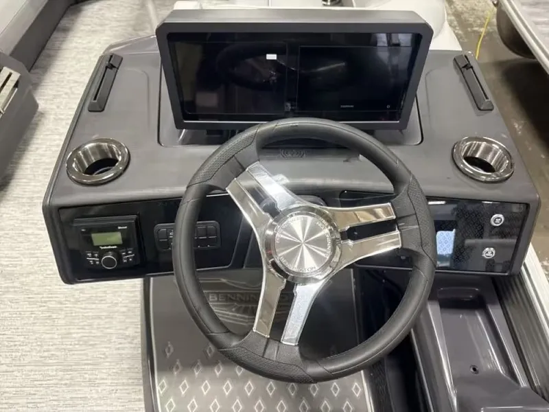 Slide: The Image of Bennington 24 MFB 2026 helm with steering wheel and display screen. - 5