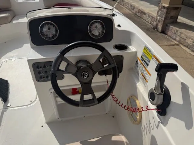 Slide: The Image of 2014 Hurricane SSR188 boat console with steering wheel and gauges. - 15