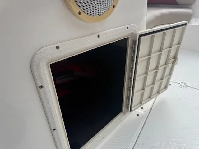 Slide: The Image of Open storage hatch on a 2014 Hurricane SSR188 boat. - 20