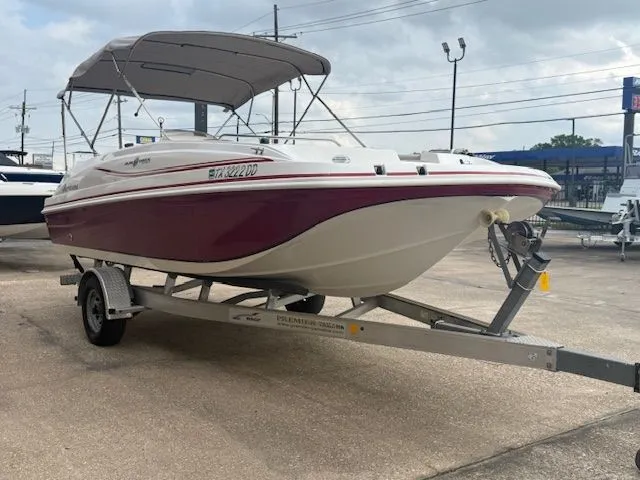 Slide: The Image of 2014 Hurricane SSR188 boat parked on trailer outdoors. - 5