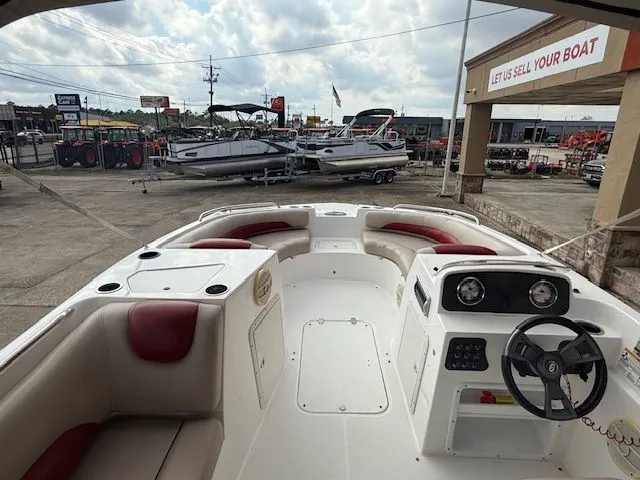 Slide: The Image of Interior view of a 2014 Hurricane SSR188 boat at a sales lot. - 9