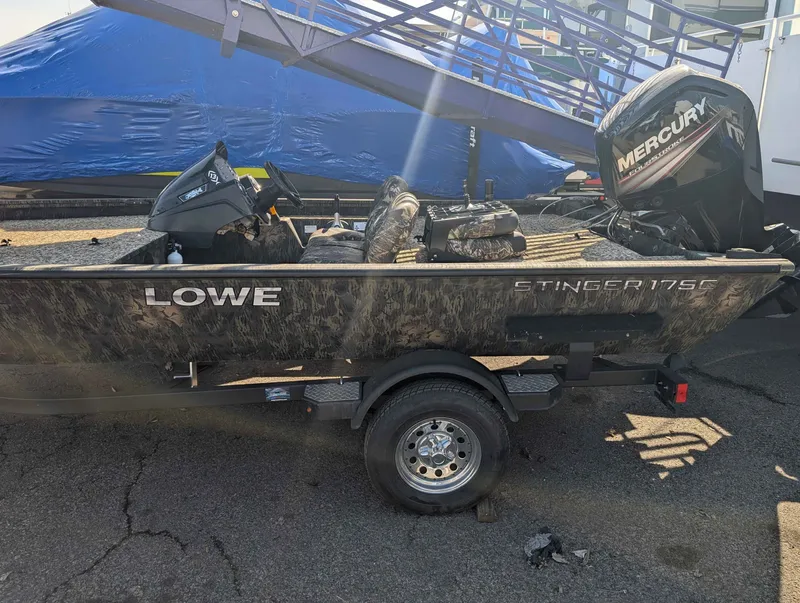 Slide: The Image of 2018 Lowe Stinger 175C boat with Mercury outboard motor. - 2