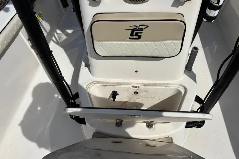 Slide: The Image of 2023 Carolina Skiff 21 LS boat interior with storage compartment and seat detail. - 10
