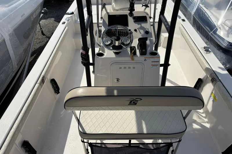 Slide: The Image of 2023 Carolina Skiff 21 LS boat interior with steering console and seating. - 6