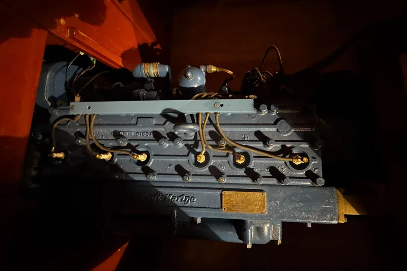 Slide: The Image of 1948 Chris-Craft Sportster 25 engine, detailed view with visible components and wiring. - 18