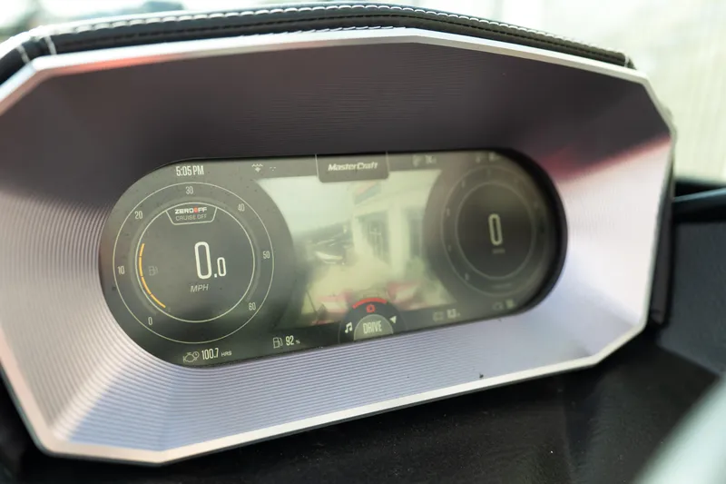 Slide: The Image of Dashboard display of a 2021 MasterCraft X24 boat showing speed and settings. - 14