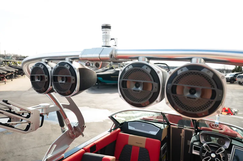 Slide: The Image of 2021 MasterCraft X24 boat with premium audio speakers and sleek interior design. - 25