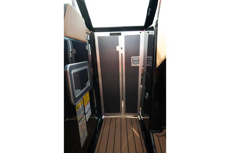 Slide: The Image of Interior view of 2021 MasterCraft X24 boat, featuring sleek design and modern finishes. - 35