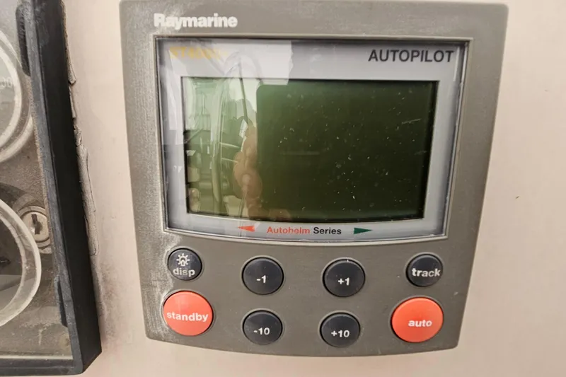 Slide: The Image of Raymarine autopilot control panel on a 1985 Nonsuch 30 sailboat. - 17
