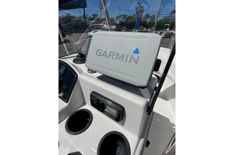 Slide: The Image of 2003 Boston Whaler 170 Montauk boat dashboard with Garmin navigation system. - 12