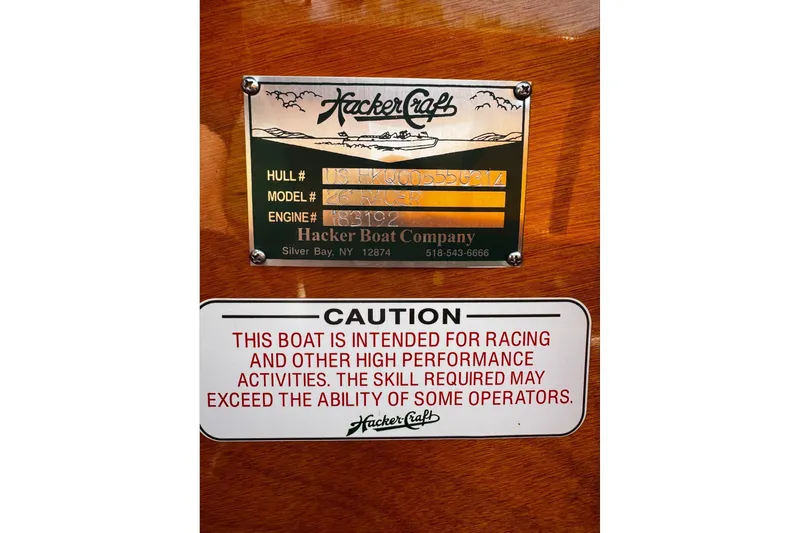 Slide: The Image of Plaque on 2014 Hacker-Craft 26' Runabout, cautioning high-performance use. - 23