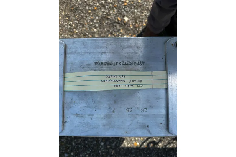 Slide: The Image of Metal plate with handwritten note, Hacker-Craft 26' Runabout, 2014 model details. - 24