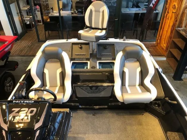 Slide: The Image of Interior view of 2026 Nitro Z20 XL boat with three seats. - 20