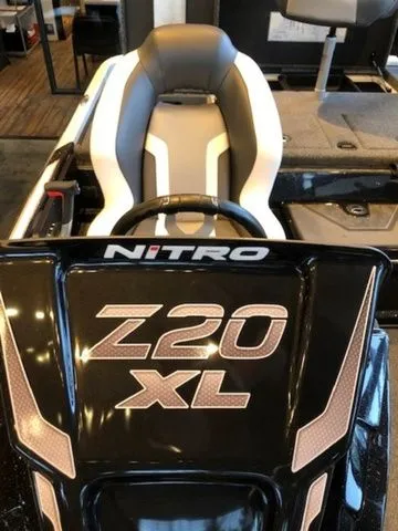 Slide: The Image of 2026 Nitro Z20 XL boat cockpit view with seat and steering. - 21