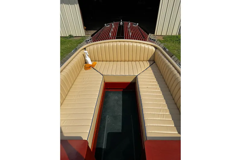 Slide: The Image of 2016 Hacker-Craft 28 Sport boat with beige leather seating and polished wood finish. - 13