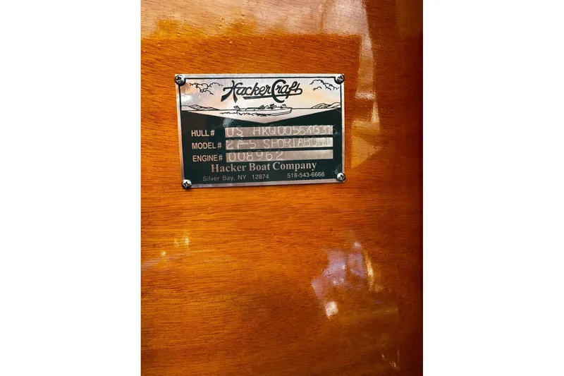 Slide: The Image of Plaque on 2016 Hacker-Craft 28 Sport boat, displaying hull and model information. - 19