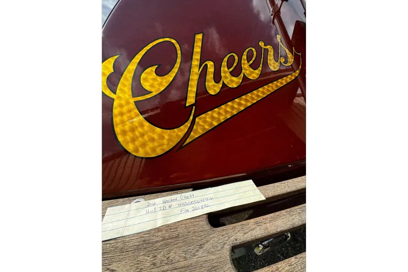 Slide: The Image of 2016 Hacker-Craft 28 Sport boat with "Cheers" lettering on the hull. - 3