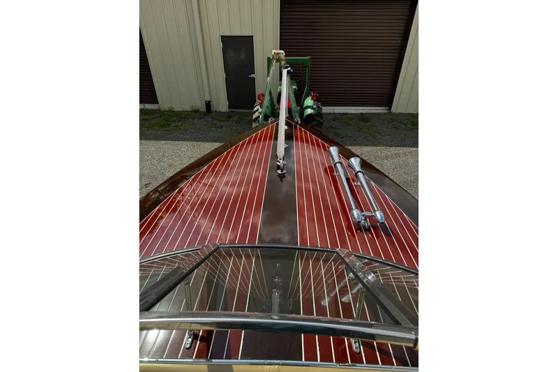 Slide: The Image of 2016 Hacker-Craft 28 Sport boat with polished wood deck and chrome accents. - 4