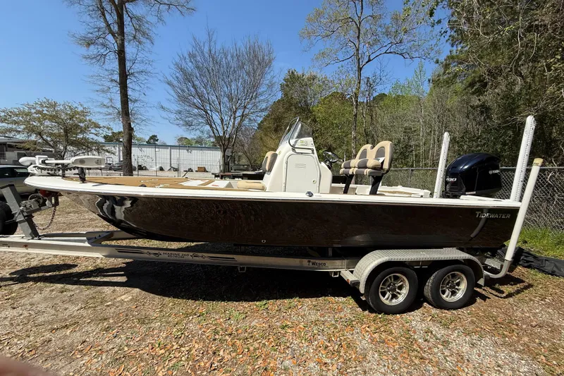 The Image of 2016 Tidewater 2110 Bay Max boat on trailer, parked outdoors. - 0