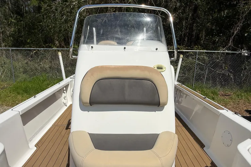 Slide: The Image of 2016 Tidewater 2110 Bay Max boat interior with seating and console. - 20