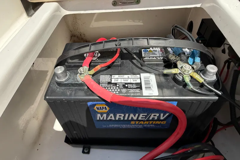 Slide: The Image of Marine battery in a 2016 Tidewater 2110 Bay Max boat compartment. - 32
