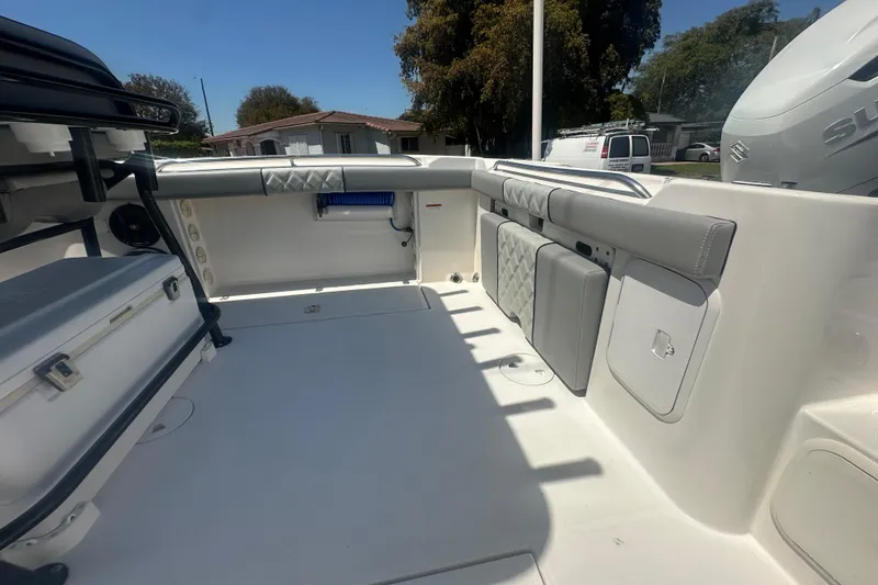 Slide: The Image of 2006 Wellcraft 32 CCF boat interior with seating and storage compartments. - 52