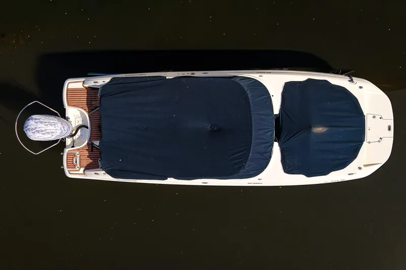 Slide: The Image of 2017 Hurricane SunDeck 2690 OB boat with covers, aerial view. - 26