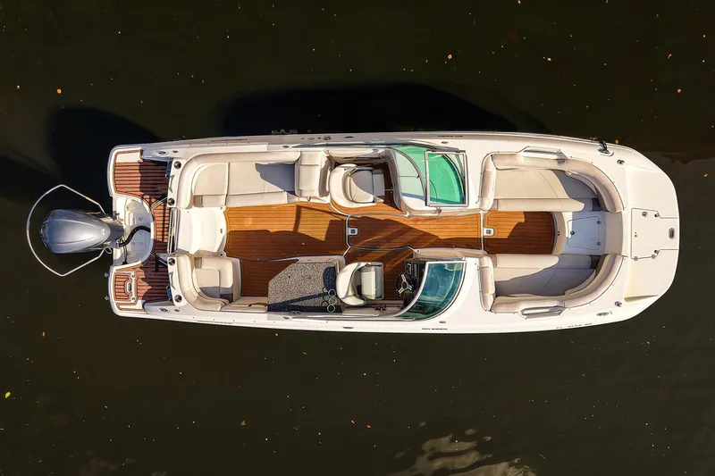 Slide: The Image of Overhead view of 2017 Hurricane SunDeck 2690 OB boat on water. - 3