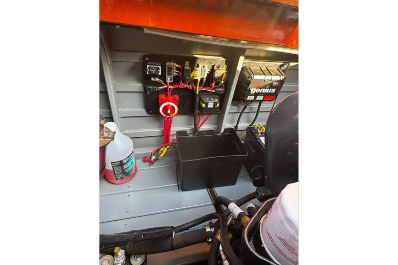 Slide: The Image of Electrical components inside a 2019 Hacker-Craft 23 Runabout boat. - 12