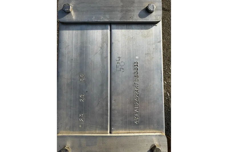 Slide: The Image of Metal plate with engraved numbers and letters, related to 2019 Hacker-Craft 23 RUNABOUT. - 19