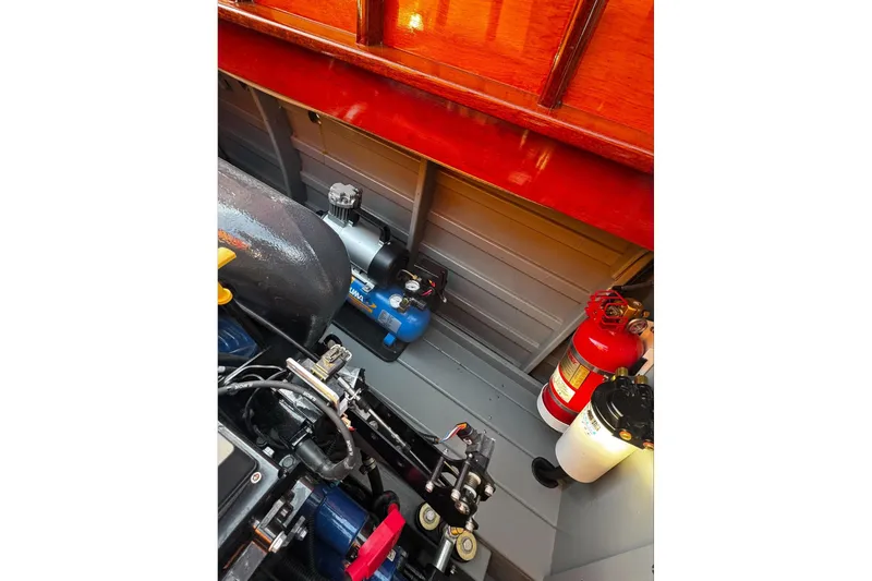 Slide: The Image of Engine compartment of 2019 Hacker-Craft 23 Runabout with fire extinguisher and equipment. - 20