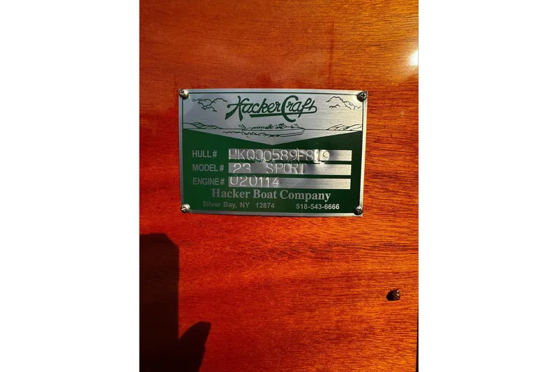 Slide: The Image of Plaque on 2019 Hacker-Craft 23 RUNABOUT, displaying hull and engine details. - 24