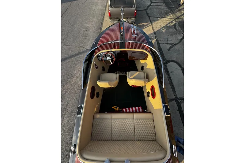 Slide: The Image of 2019 Hacker-Craft 23 Runabout boat with luxurious interior, viewed from above. - 26