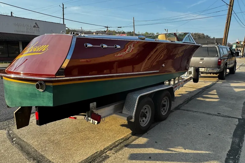 Slide: The Image of 2019 Hacker-Craft 23 Runabout boat on trailer, parked outdoors. - 27