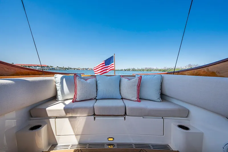 Slide: The Image of Luxurious interior of 2017 Hinckley Talaria 34R yacht with elegant seating and wooden accents. - 13