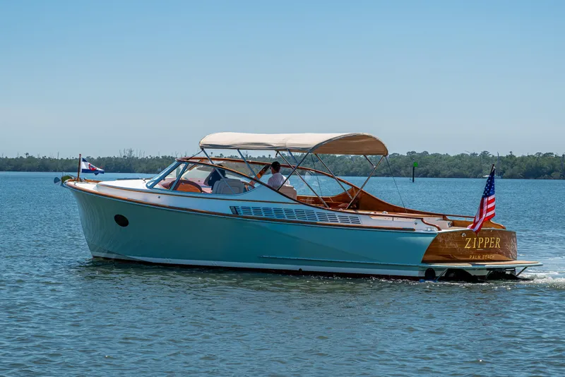 Slide: The Image of 2017 Hinckley Talaria 34R cruising on a sunny day, displaying elegance and craftsmanship. - 4