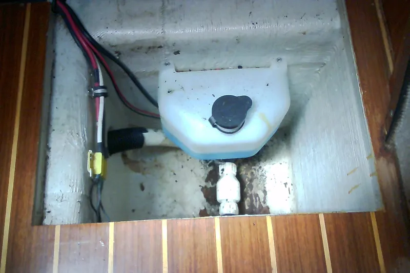 Slide: The Image of Cozy cabin bedroom in 1999 Sabre 34 yacht with seaside-themed bedding. - 56