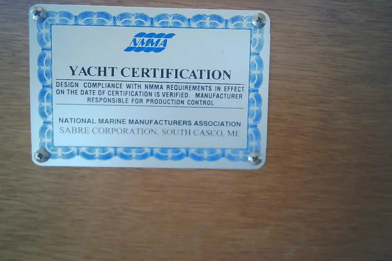 Slide: The Image of Yacht certification plaque for Sabre 34, 1999, by NMMA and Sabre Corporation. - 37