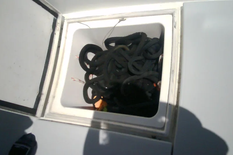 Slide: The Image of Boat storage compartment with coiled ropes, Sabre 34, 1999 model. - 45