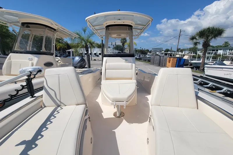 Slide: The Image of 2019 Grady-White 251 Coastal Explorer boat with spacious seating and modern design. - 5