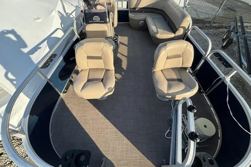 Slide: The Image of 2022 Sun Tracker Bass Buggy 16 XL pontoon boat interior with beige seating. - 7