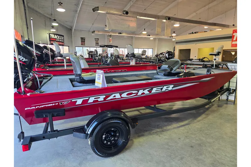 Slide: The Image of 2026 Tracker Panfish 17 boat in showroom, red exterior, modern design. - 46