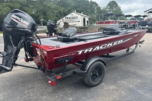 The Image of 2026 Tracker Panfish 17 boat with Mercury engine, parked on a trailer in a lot. - 0