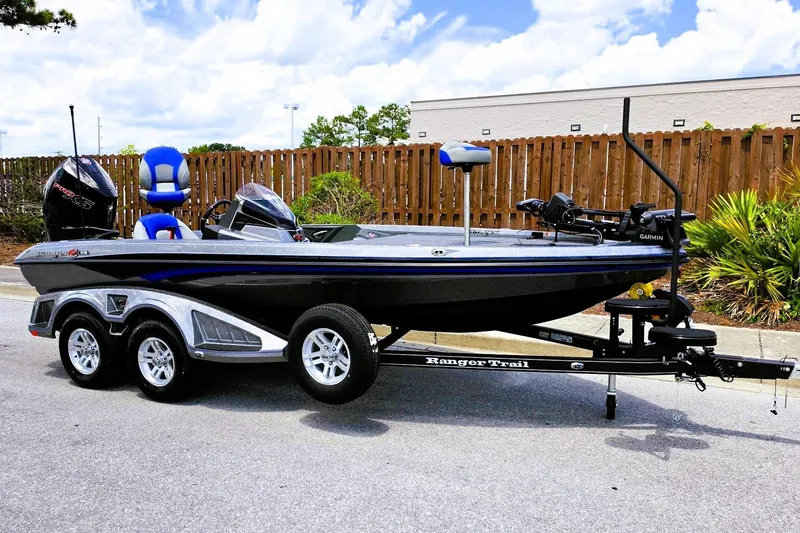 Slide: The Image of 2026 Ranger Z518 Cup-Equipped boat on trailer, parked outdoors. - 4