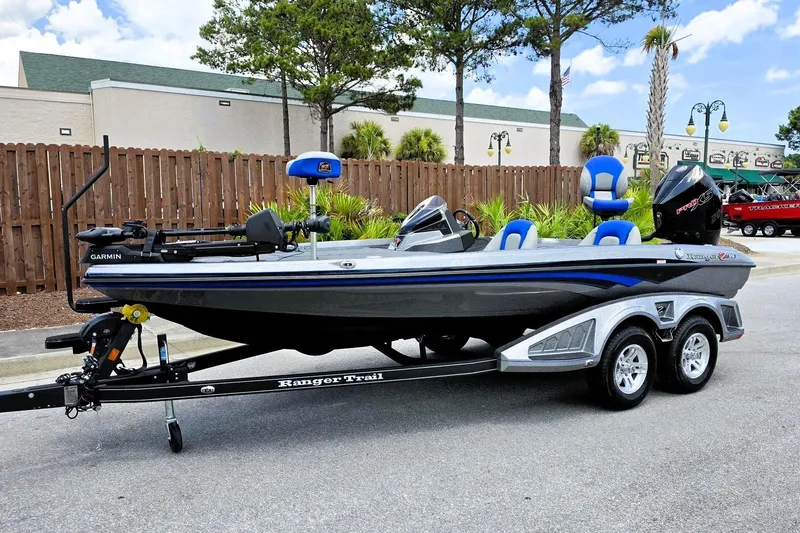 Slide: The Image of 2026 Ranger Z518 Cup-Equipped boat on trailer, parked outdoors. - 8