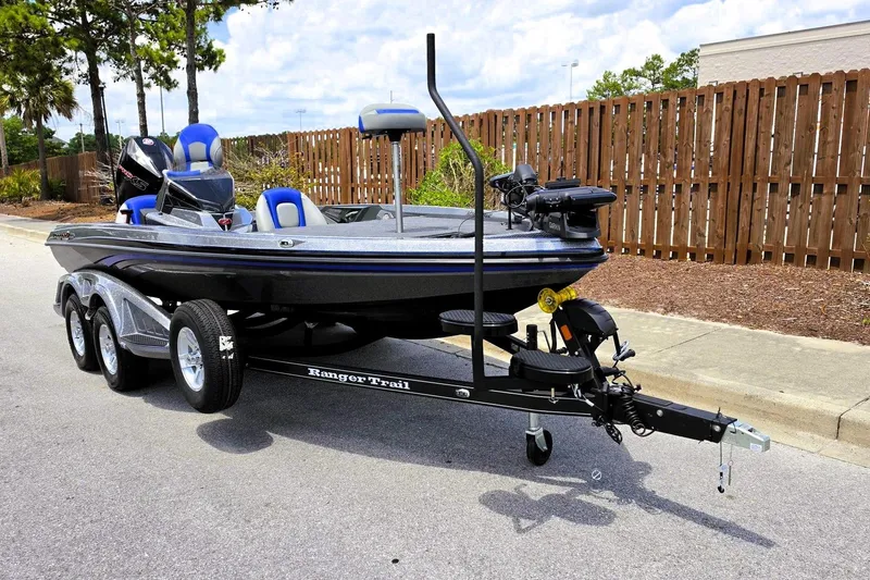 Slide: The Image of 2026 Ranger Z518 Cup-Equipped boat on trailer, parked outdoors. - 5