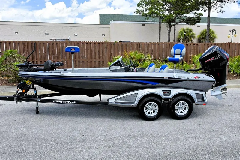 Slide: The Image of 2026 Ranger Z518 Cup-Equipped boat on trailer, featuring sleek design and powerful engine. - 7
